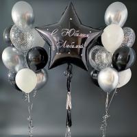 Большая чёрная звезда и фонтаны из шаров