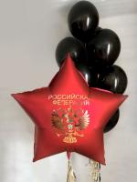 Красная звезда с надписью и фонтан из чёрных шаров